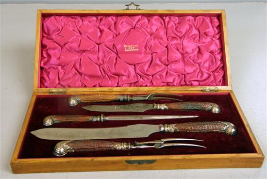 Appraisal: Late Victorian horn handled and silver mounted carving set comprising