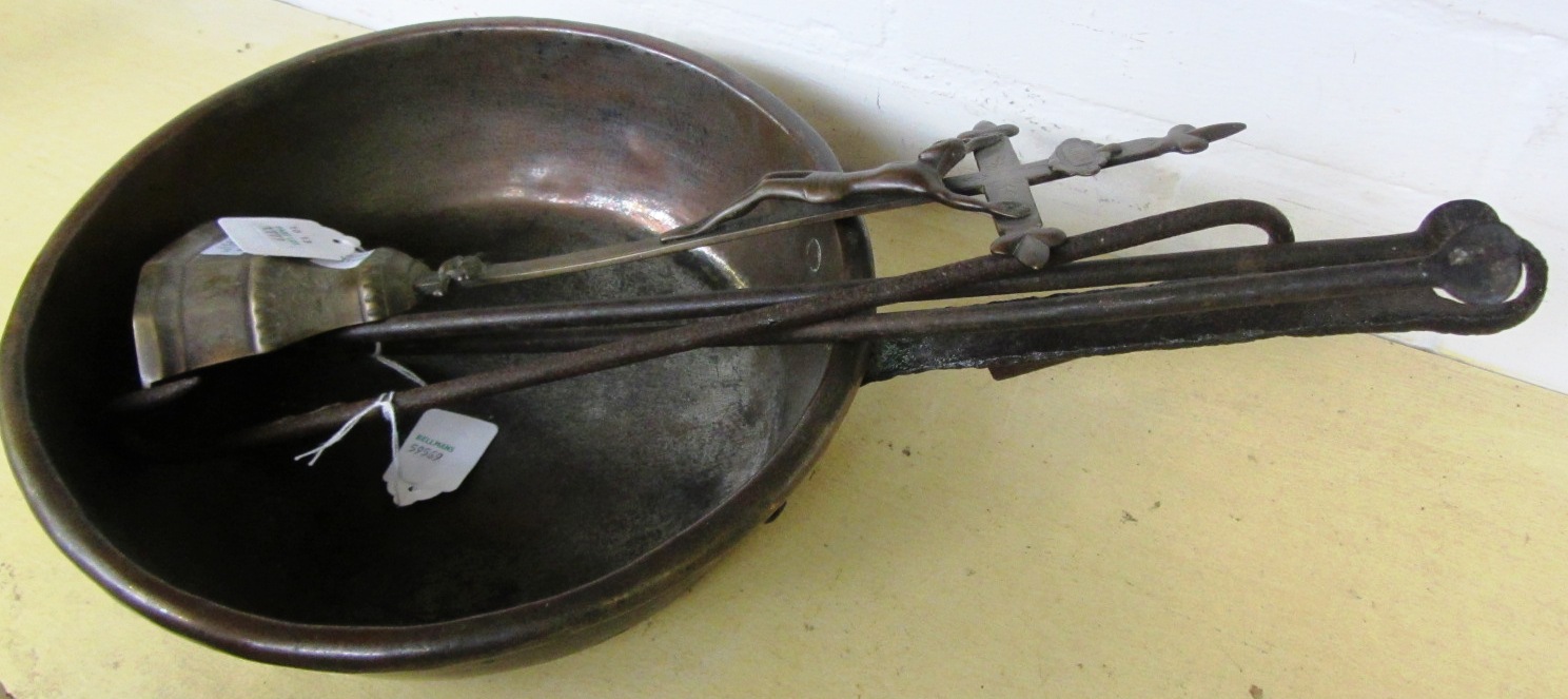 Appraisal: A copper saucepan with cast iron handle a wrought iron