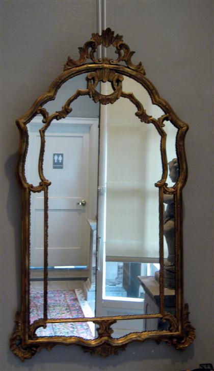 Appraisal: George II style giltwood wall mirror The shaped central mirror