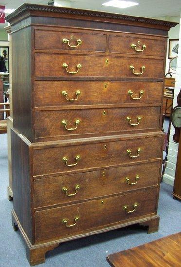 Appraisal: A th Century oak tallboy the upper section with dentil