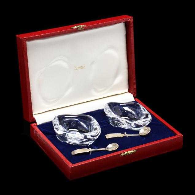 Appraisal: CARTIER PAIR OF CRYSTAL SALTS WITH SILVER SPOONS Molded crystal