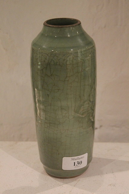 Appraisal: A CHINESE MING PERIOD CELADON TAPERING VASE with two flowerheads