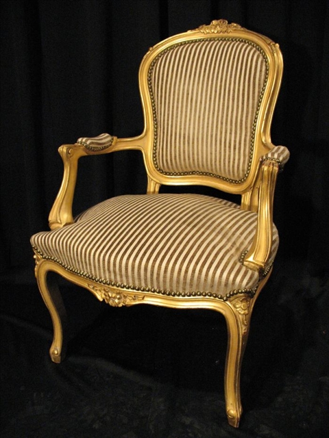 Appraisal: PAIR OF LOUIS XVI STYLE GILTWOOD CHAIRS Beige striped upholstery