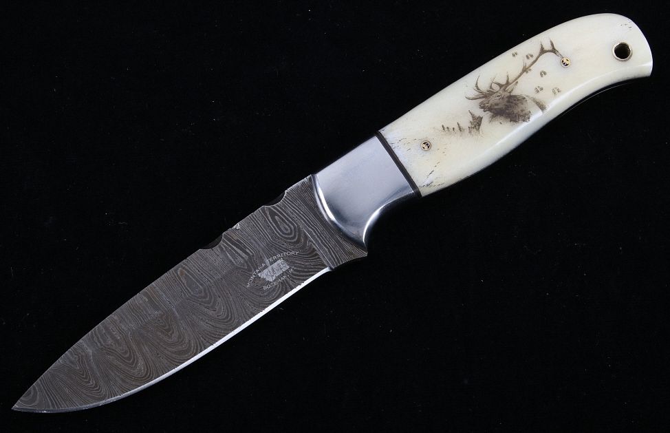 Appraisal: Yellowstone Elk Scrimshaw Damascus M T Knives This is an