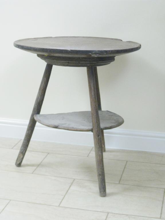 Appraisal: An antique primitive Cricket Table with slightly dished circular top