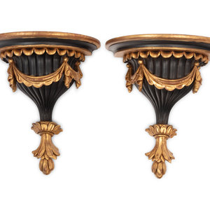 Appraisal: A Pair of Italian Parcel Gilt and Ebonized Wall Brackets