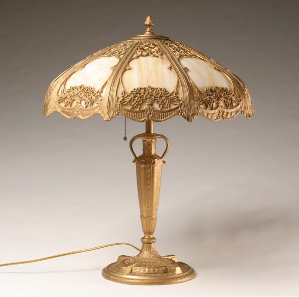 Appraisal: Slag glass table lamp with golden finish and classical overlay