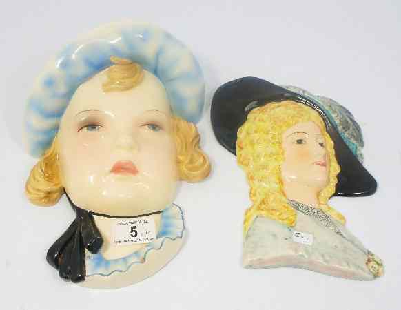 Appraisal: Gold Scheider Austrian Pottery Wall Plaques of a Girl in