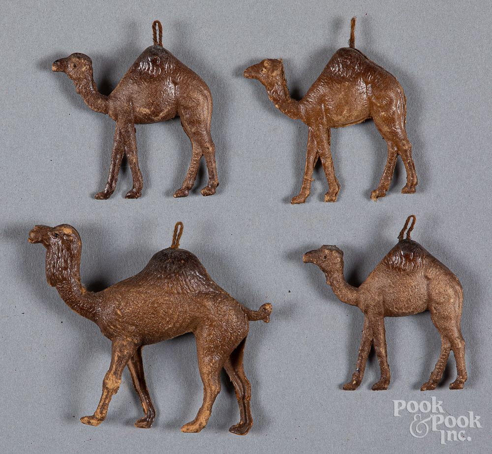 Appraisal: Four Dresden camel Christmas ornaments Four Dresden camel Christmas ornaments