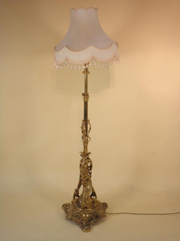 Appraisal: A late thC brass standard lamp elaborately cast in rococo