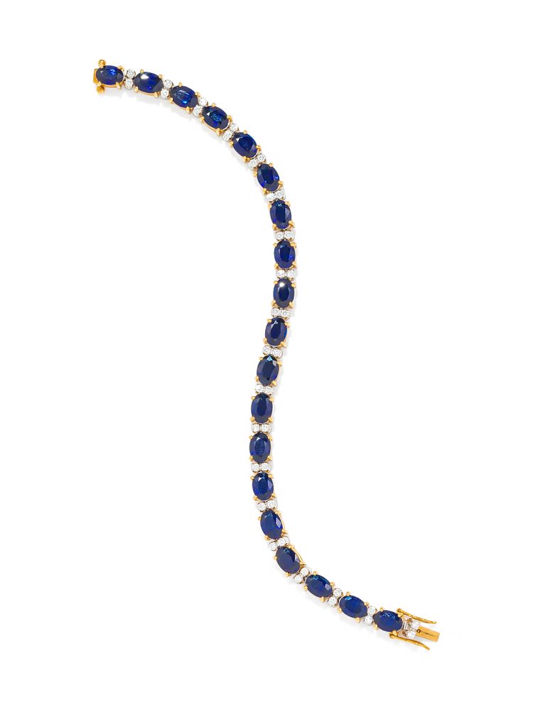 Appraisal: SAPPHIRE AND DIAMOND BRACELET SAPPHIRE AND DIAMOND BRACELET Containing oval