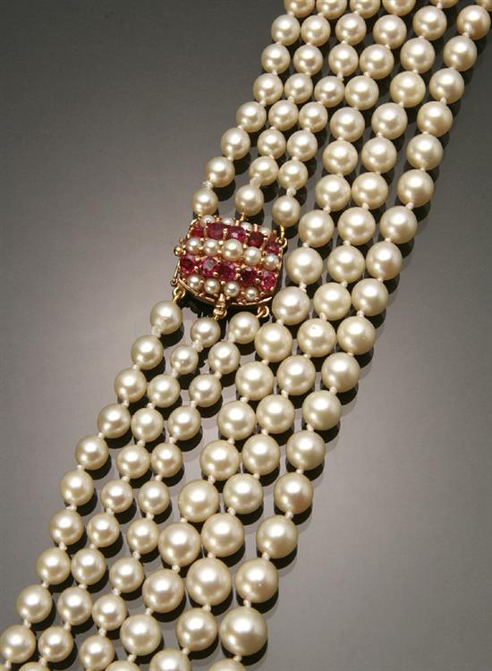 Appraisal: Matinee Length Cultured Pearl and Ruby Necklace Knotted The triple