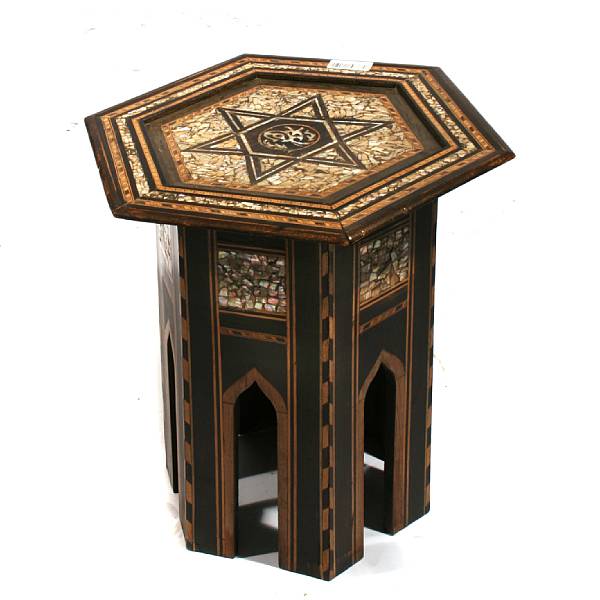 Appraisal: A Moorish style mother of pearl inlaid hardwood occassional table