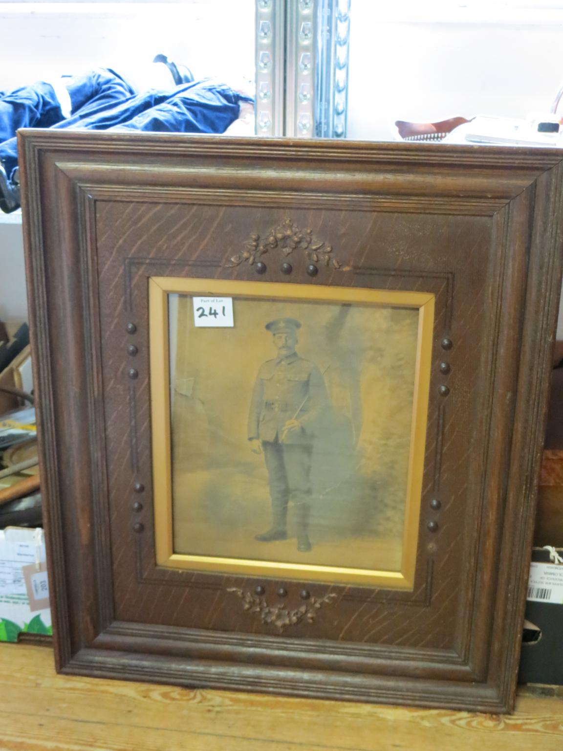 Appraisal: A pair of WWI photographic portraits in dark oak frames