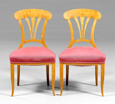 Appraisal: Pair Biedermeier style chairs fruitwood each with arched crest and