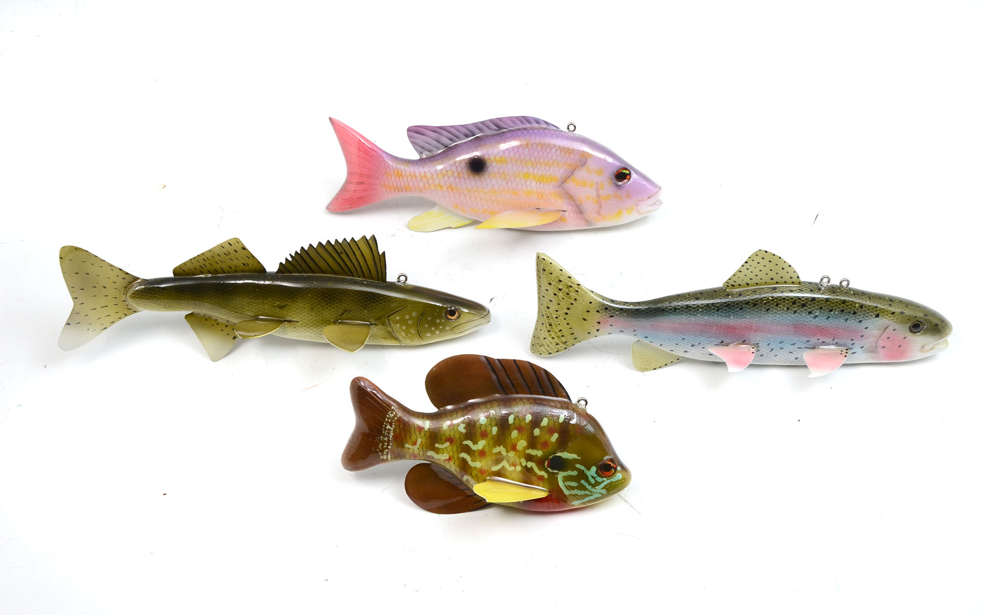 Appraisal: FOUR EXCEPTIONAL ULTRA-REALISTIC HAND-CARVED AND PAINTED FISH DECOYS POSSIBLY BY