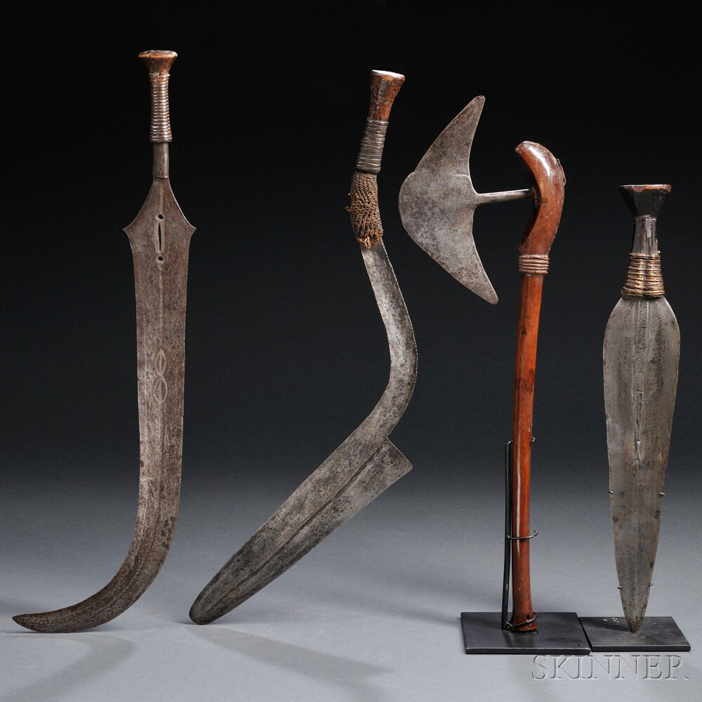 Appraisal: Four African Weapons includes two Ngombe curve-bladed swords and a