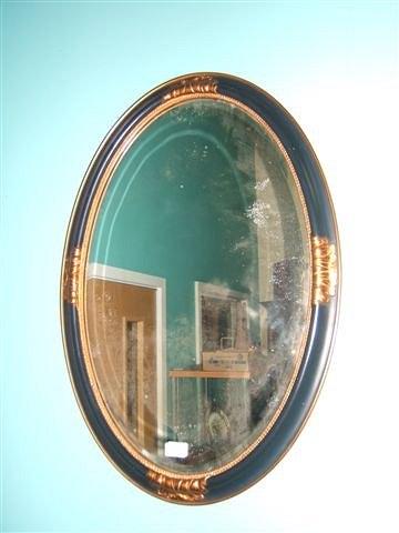 Appraisal: An oval gilt framed wall mirror x