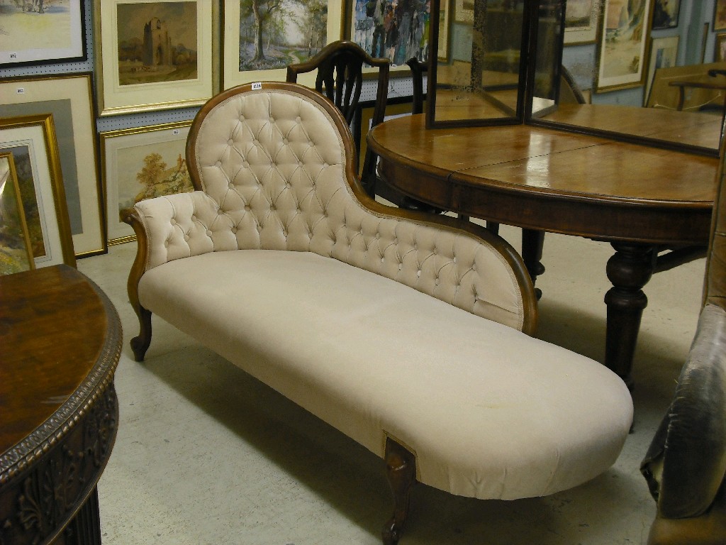 Appraisal: Victorian oak chaise longue upholstered in cream button-back Draylon and