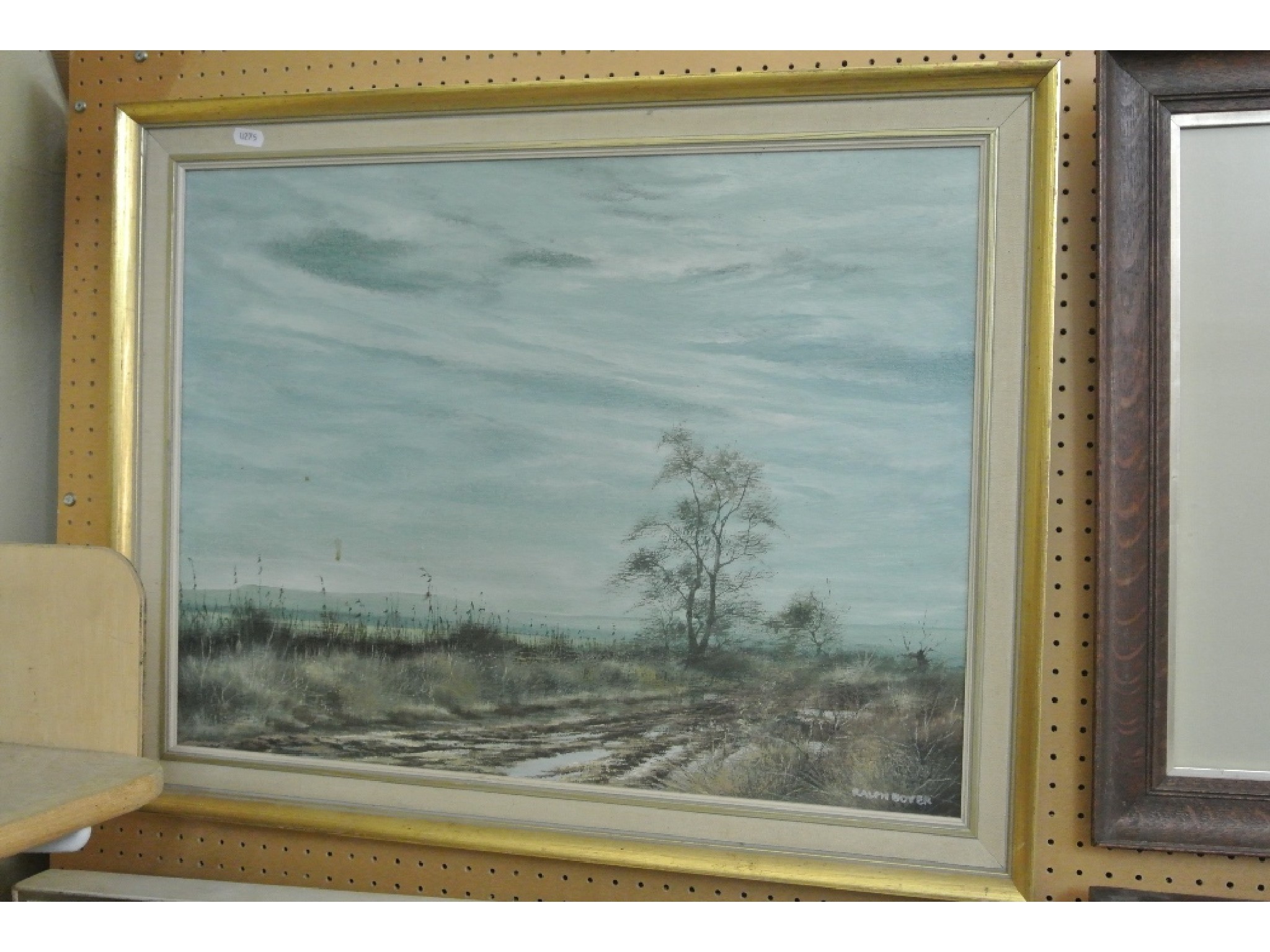 Appraisal: A th century oil painting on canvas of a landscape