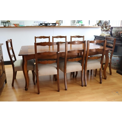 Appraisal: French style handmade table timber with eight matching chairs in