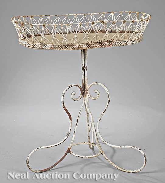 Appraisal: A French Wirework Plant Stand th c with oval wooden