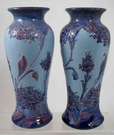 Appraisal: Pair Moorcroft Macintyre Florian Ware Vases decorated in the Lilac