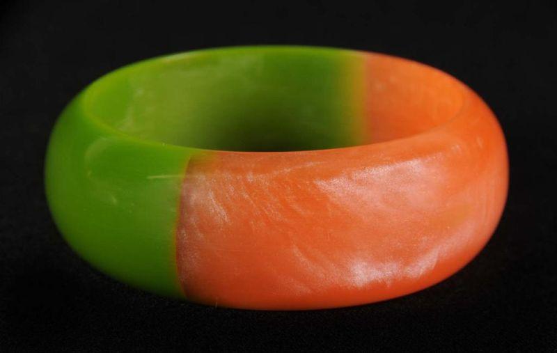 Appraisal: Bakelite Laminated Plastic Era Bracelet Description Green and pearlescent orange