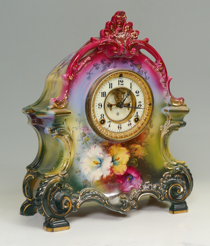 Appraisal: ANSONIA ROYAL BONN PORCELAIN CLOCK ''LA BRETAGNE'' Multi-hued rainbow effect