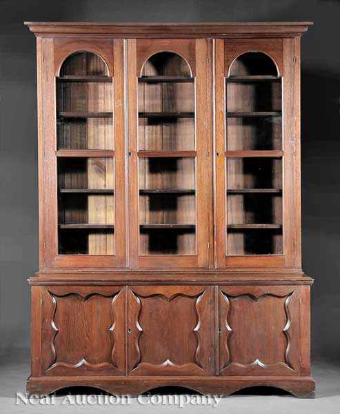 Appraisal: An American Late Classical Carved Walnut Bookcase mid- th c