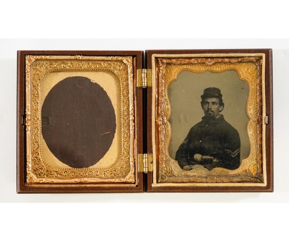 Appraisal: Tintype of a Civil War soldier wearing corporal stripes mounted