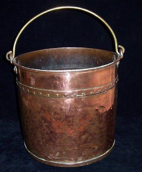 Appraisal: A copper pail with brass swing handle cm high