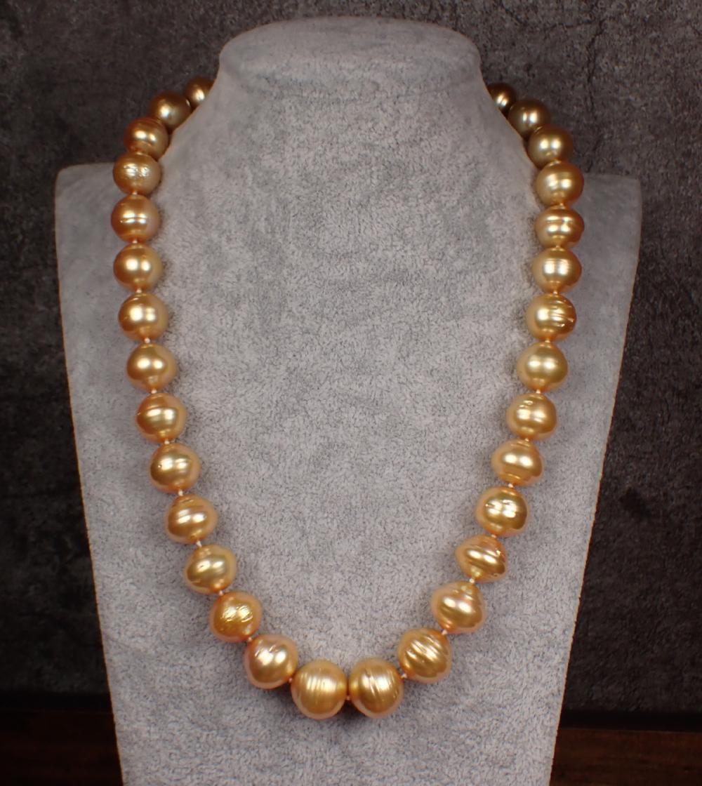 Appraisal: GOLDEN SOUTH SEA PEARL AND FOURTEEN KARAT GOLD NECKLACE -