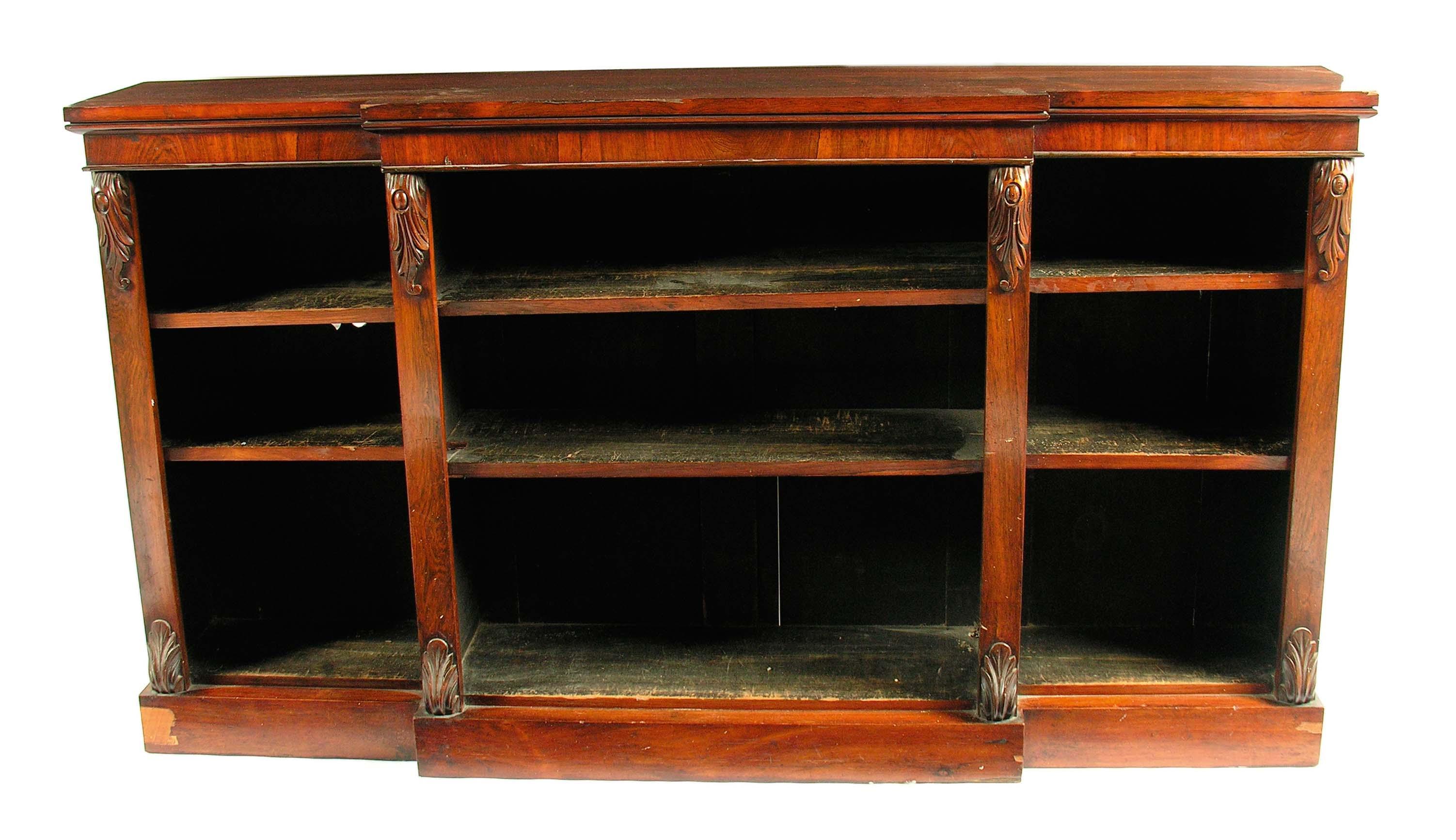 Appraisal: An early Victorian rosewood breakfront open bookcase