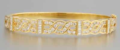 Appraisal: A Ladies' Diamond and Gold Bangle Bracelet Tested k yellow