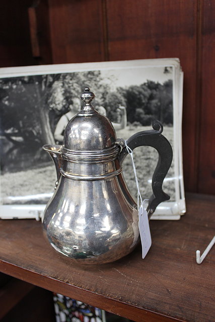 Appraisal: AN OLD SILVER BALUSTER SHAPED HOT WATER JUG with bone