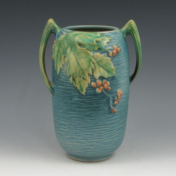 Appraisal: Roseville Bushberry handled vase in blue Marked Roseville USA -