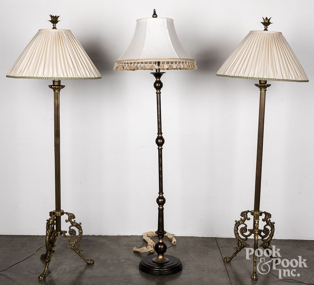 Appraisal: Pair of brass floor lamps and another lamp Pair of