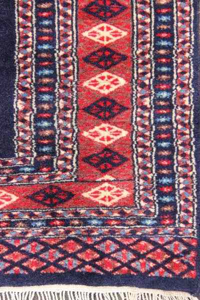 Appraisal: Turkamin Style Runnercotton foundation wool pile traditional Tekke style with