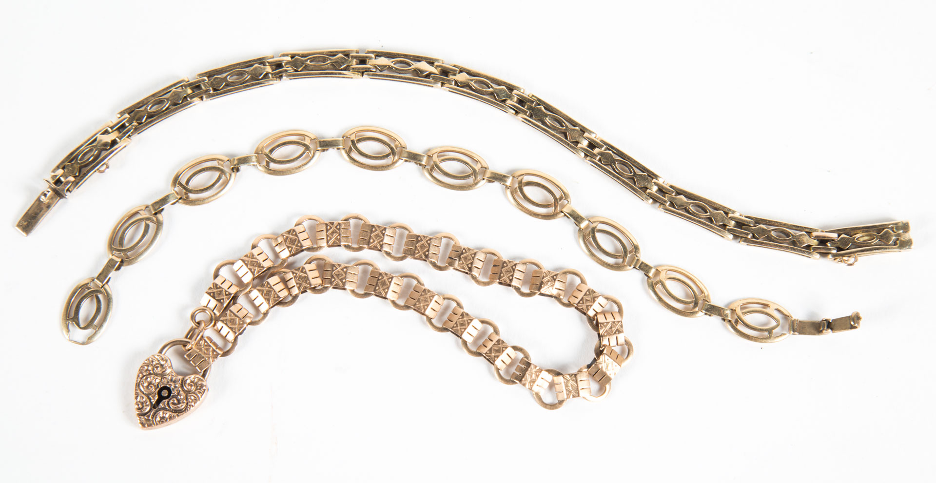 Appraisal: A Lady's Trio of Gold Bracelets K oval link L