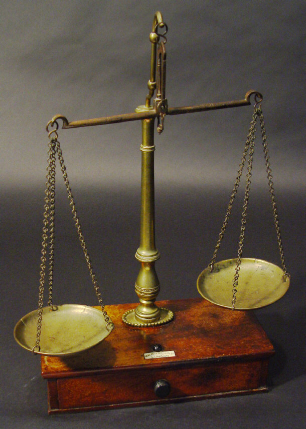 Appraisal: Set of Roberts brass balance scales and pans on a