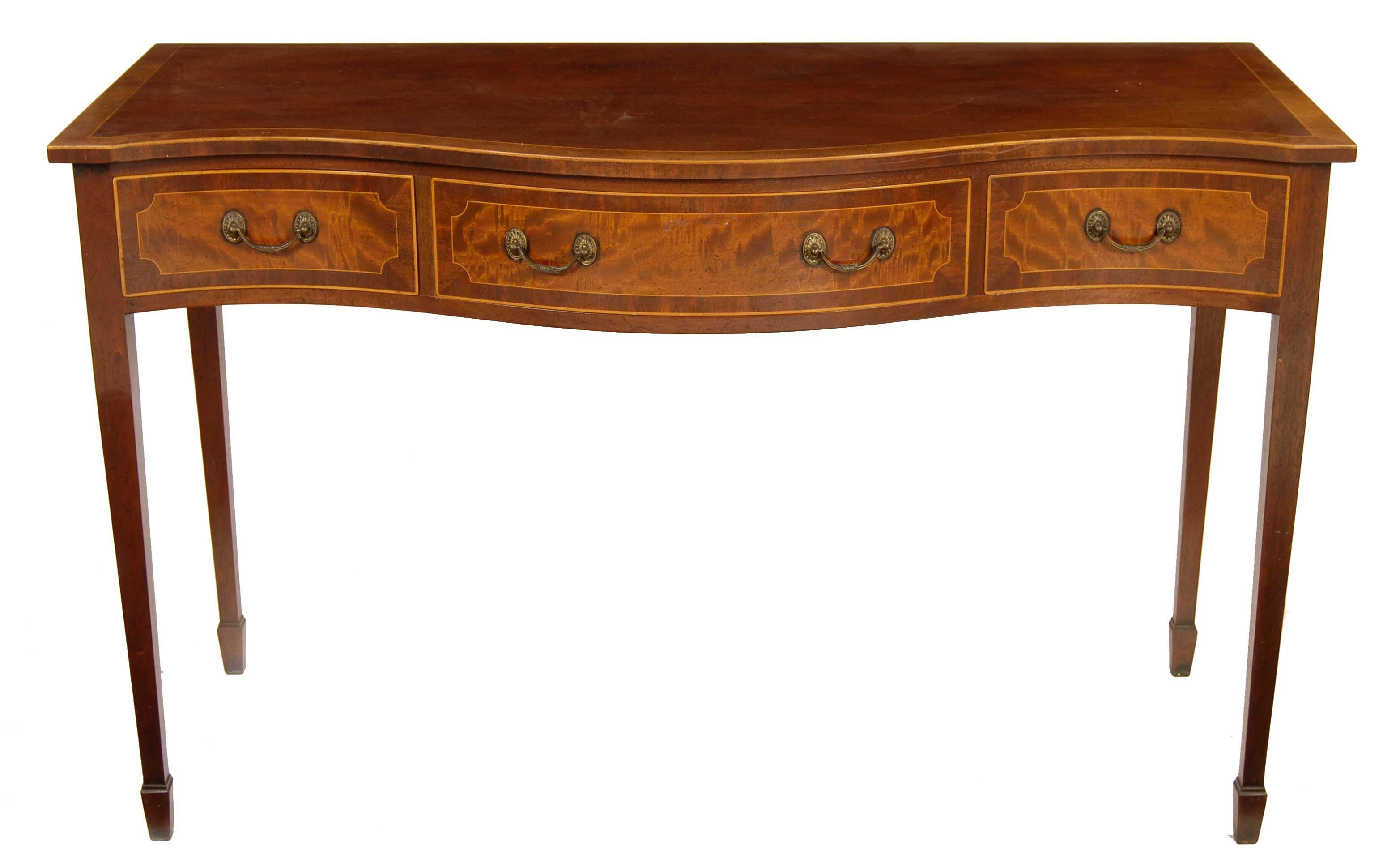 Appraisal: A modern mahogany serpentine front serving table