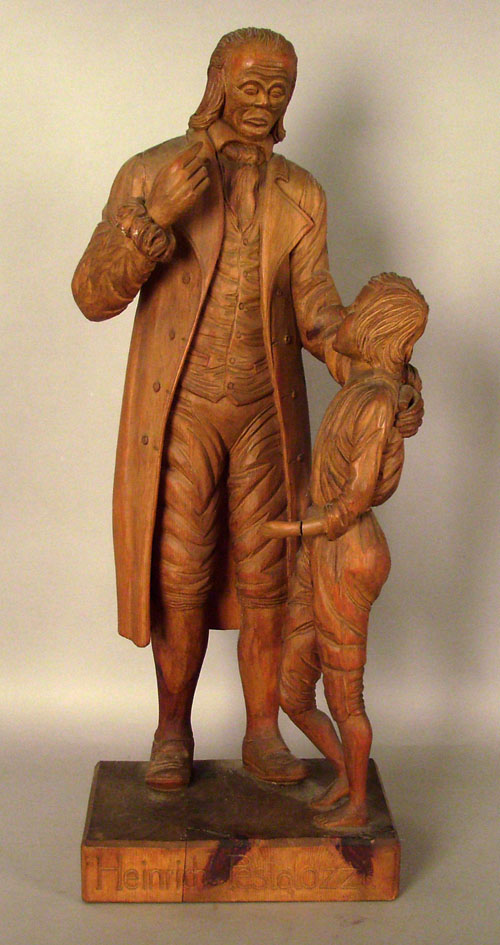 Appraisal: German carved figure of Heinrich Pestalozzi stamped g v A