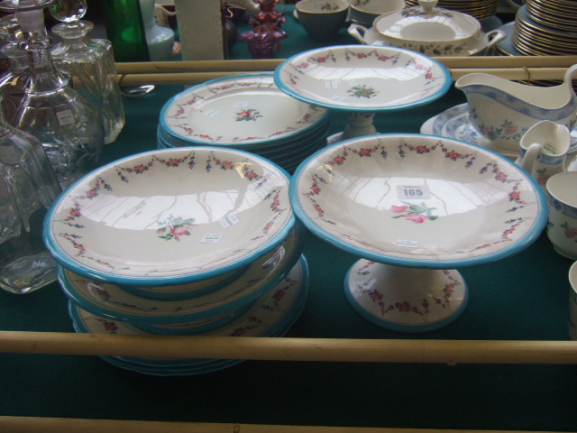 Appraisal: A Mintons dessert service decorated with floral swags within a