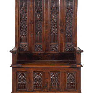 Appraisal: A Gothic Style Carved Oak Hall Bench Late th Century