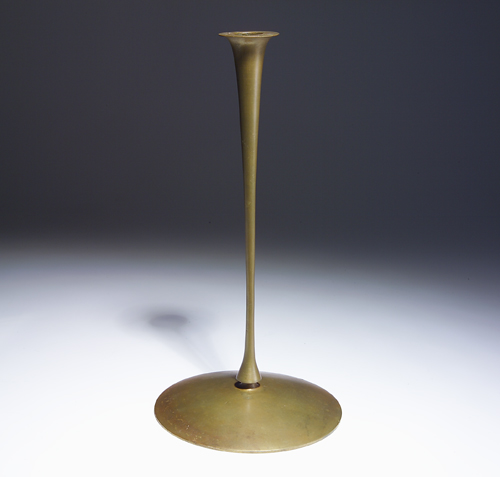 Appraisal: JESSIE PRESTON Tall brass candlestick with circular base and trumpet-shaped