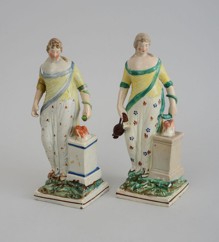 Appraisal: PAIR OF PEARLWARE ALLEGORICAL FIGURES From the same model each