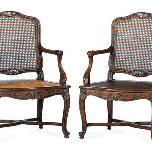 Appraisal: A Pair of Louis XV Style Caned Fauteuils th Century