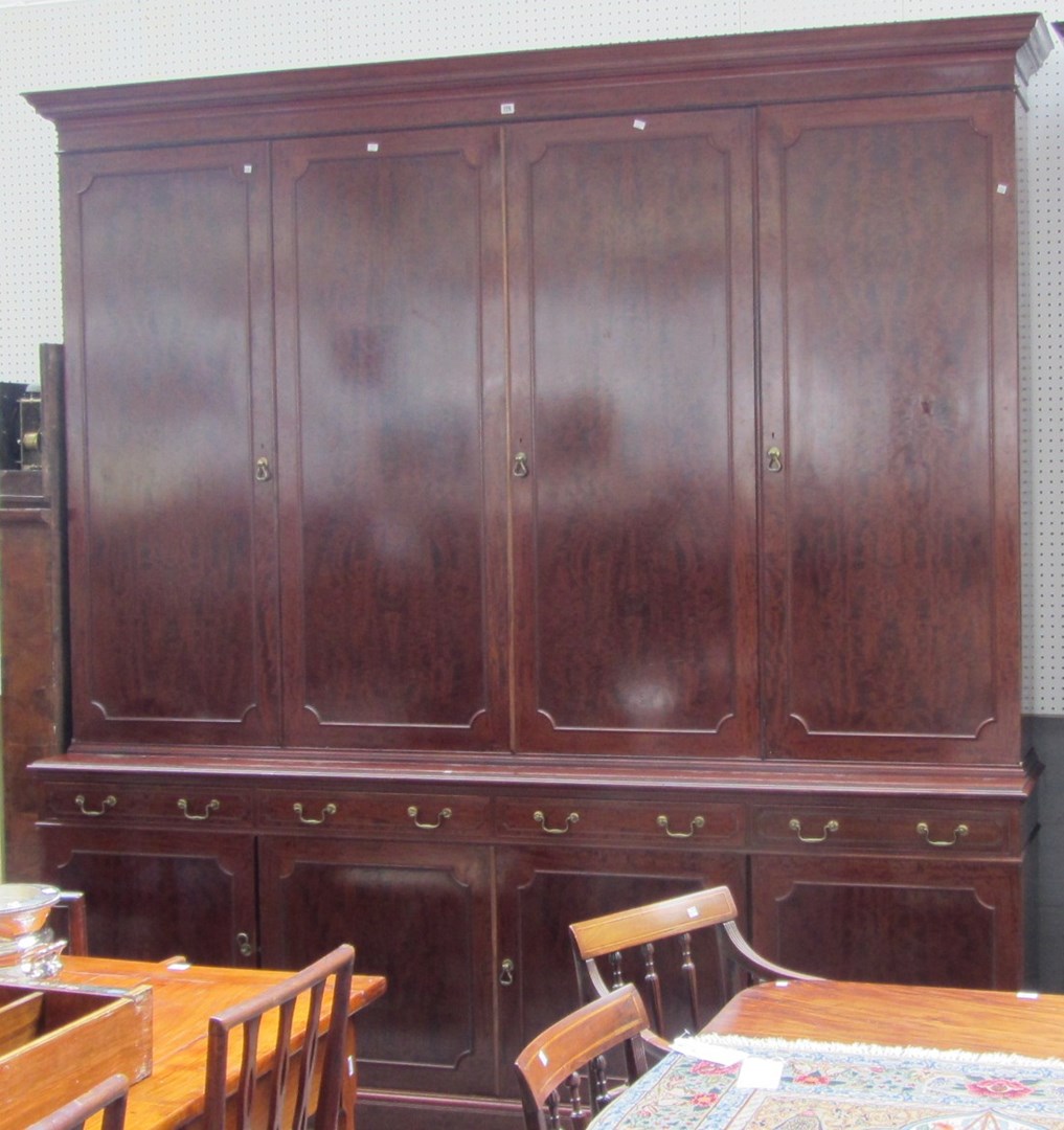 Appraisal: A Victorian style mahogany bookcase with four panel doors over