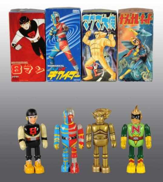 Appraisal: Lot of Contemporary Billiken Superhero Toys Description Japanese Wind-up mechanisms